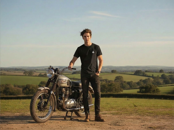 Cool guy stood with motorbike wearing a black heavy weight aviation t shirt
