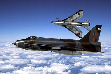 Two English Electric Lightning aircraft flying above clouds photographed by Ian Black